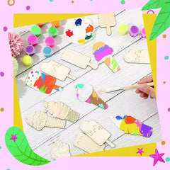 Children's art project with colorful ice cream-themed wooden stamps on a white surface.