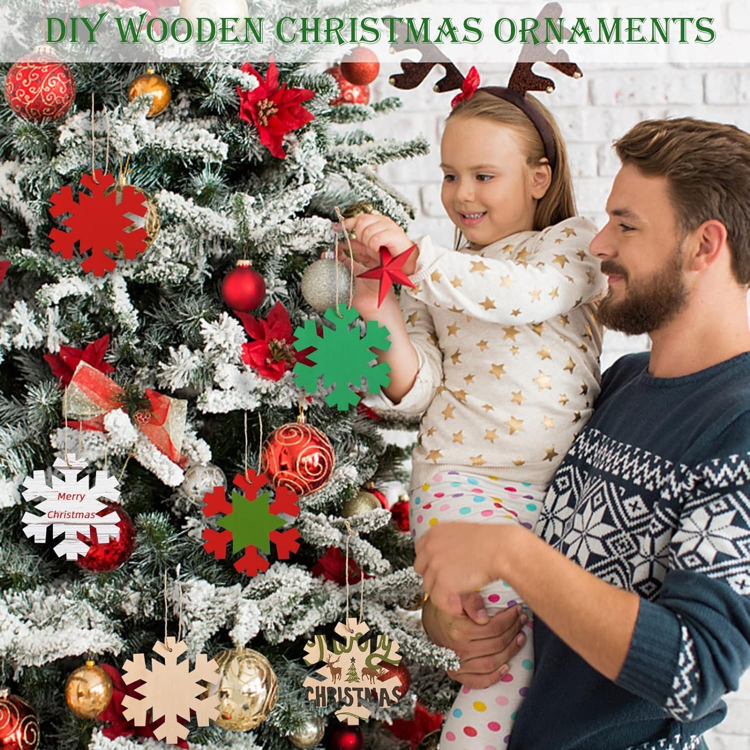 Man and child decorating a Christmas tree with DIY wooden ornaments.