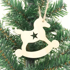 Wooden rocking horse ornament with a star on a Christmas tree.