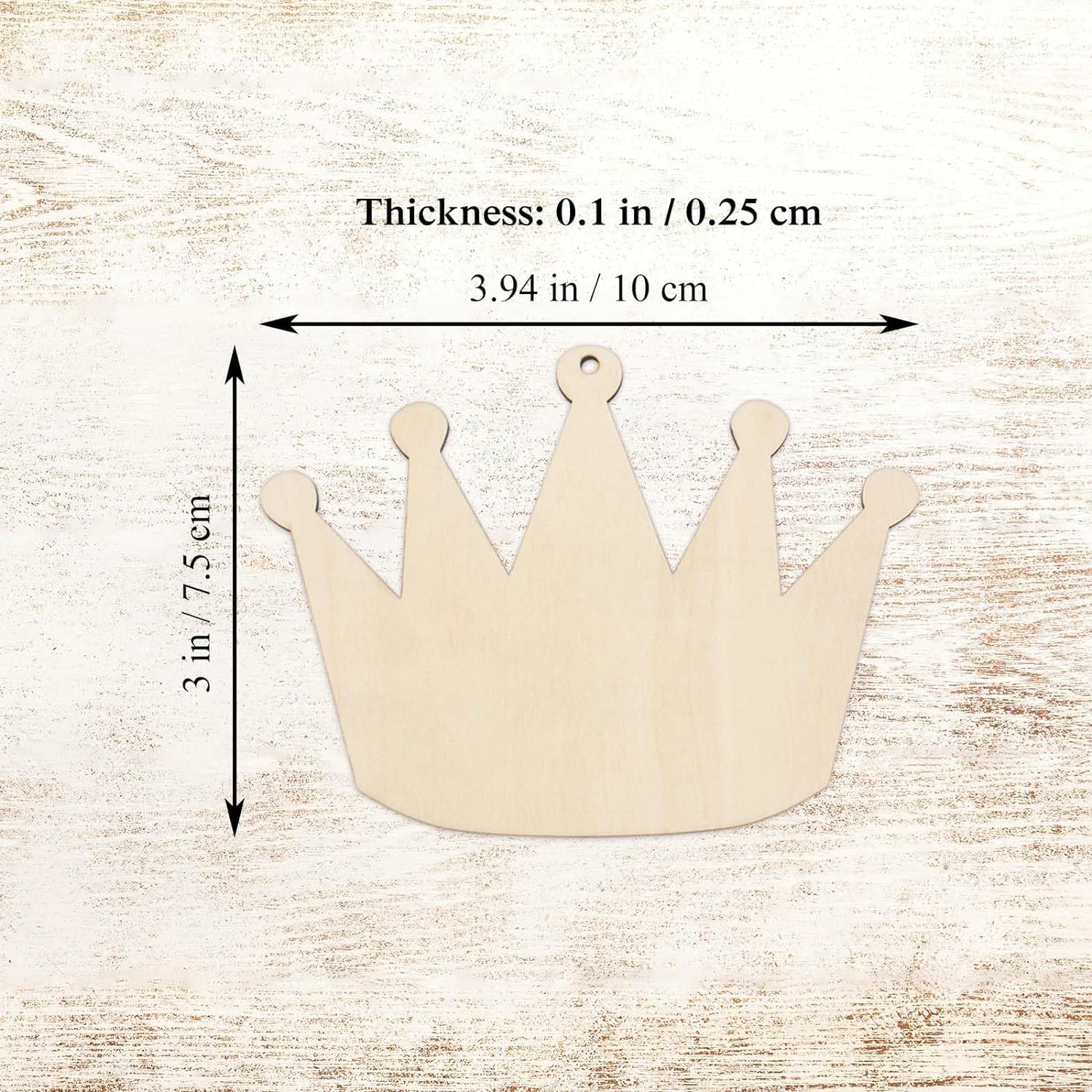 Wooden crown shape with measurements on a wooden background