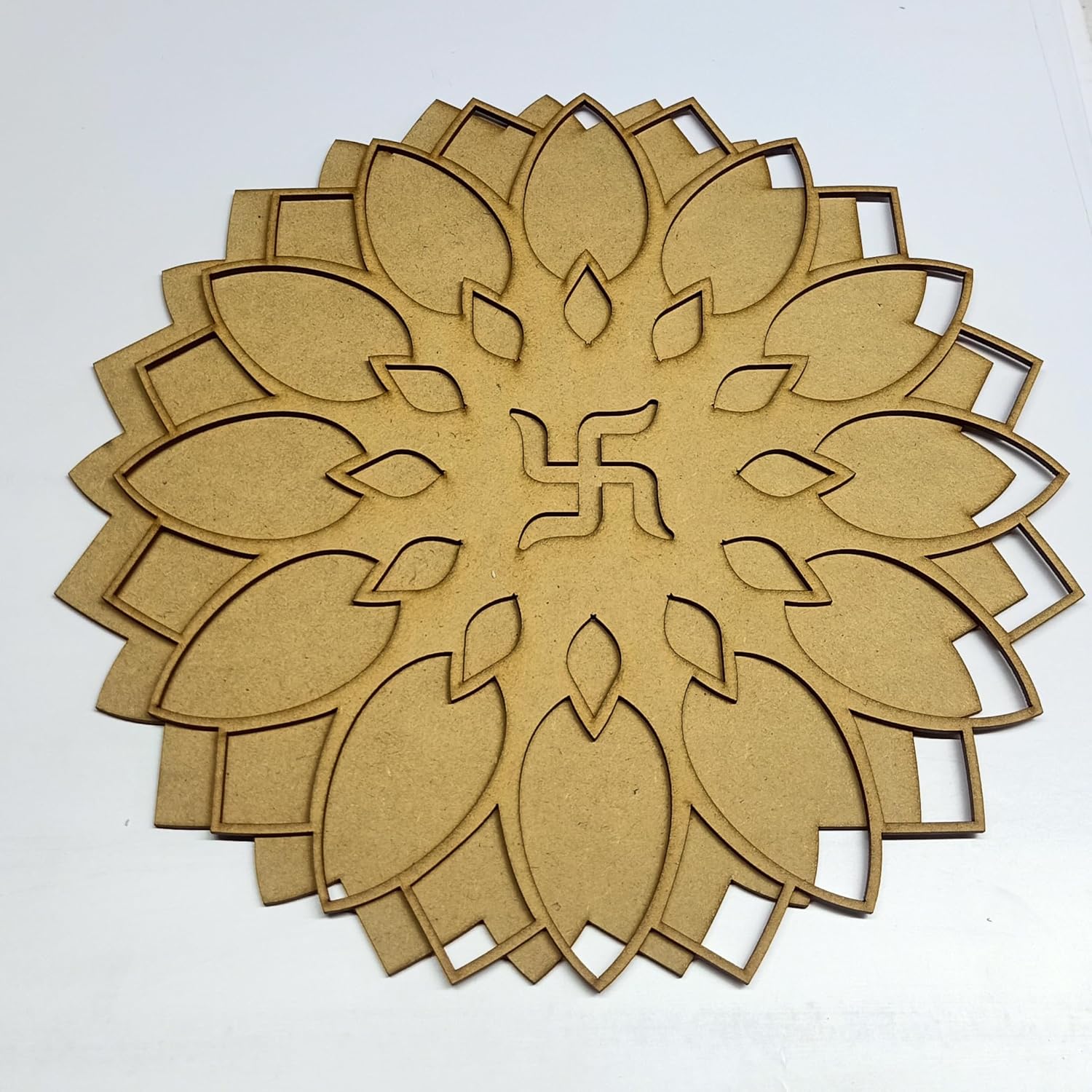 Wooden decorative piece with leaf pattern on a white background