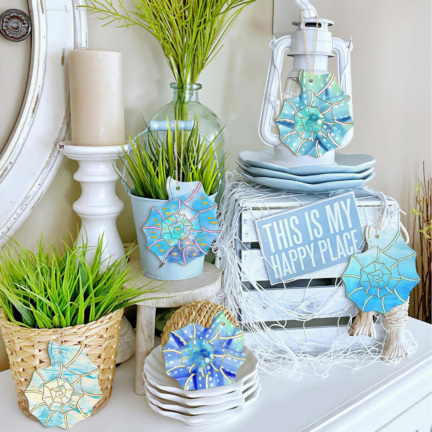 Decorative items including plants, coasters, and a sign on a shelf.