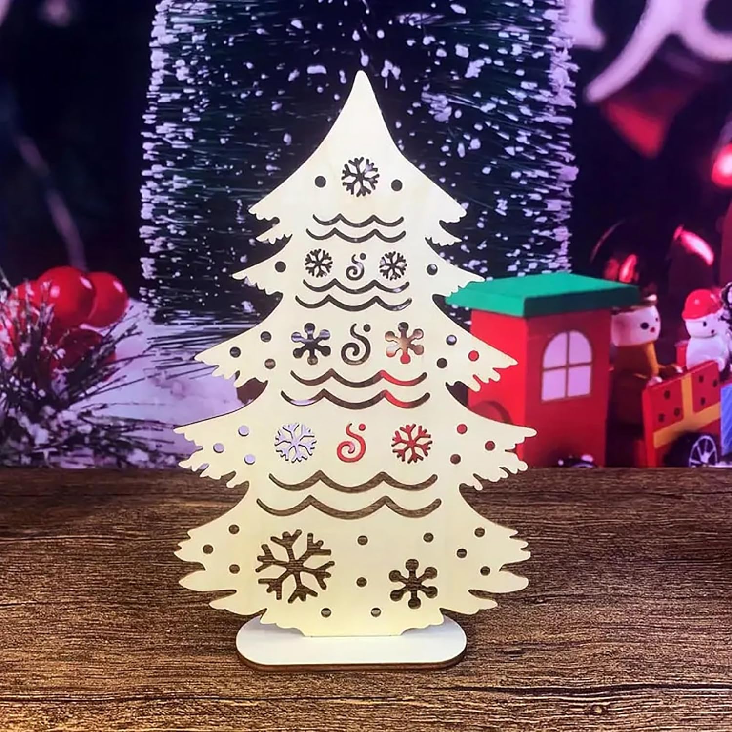 Decorative Christmas tree light on a wooden surface with festive background