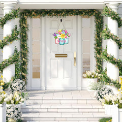 Decorative front door with floral arrangements and a 'Spring' sign.