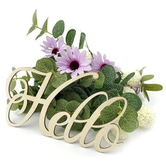 Decorative 'Hello' sign with flowers on a white background