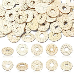 Wooden donut-shaped cutouts with various designs on a white background