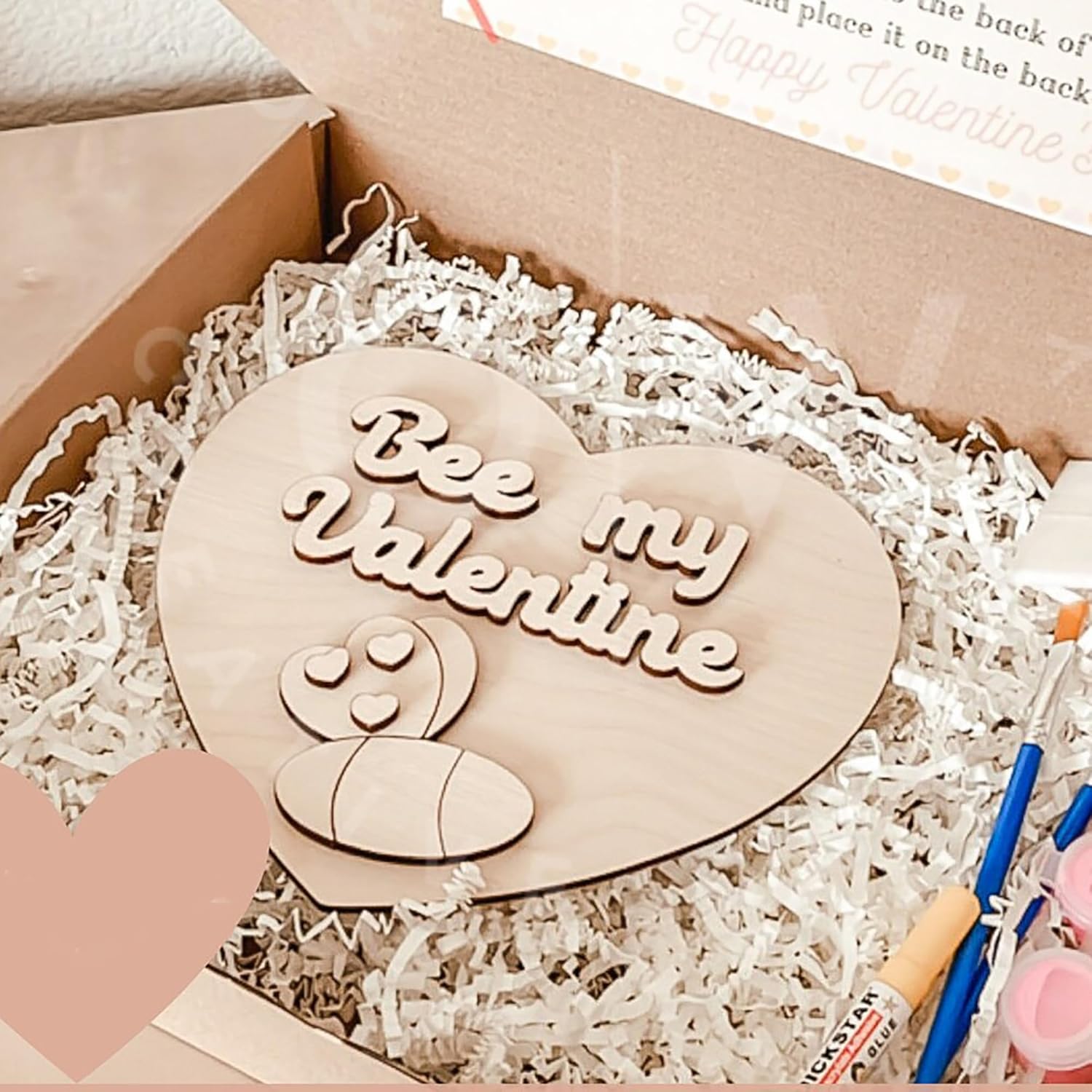 Heart-shaped wooden plaque with 'Bee my Valentine' text in a box