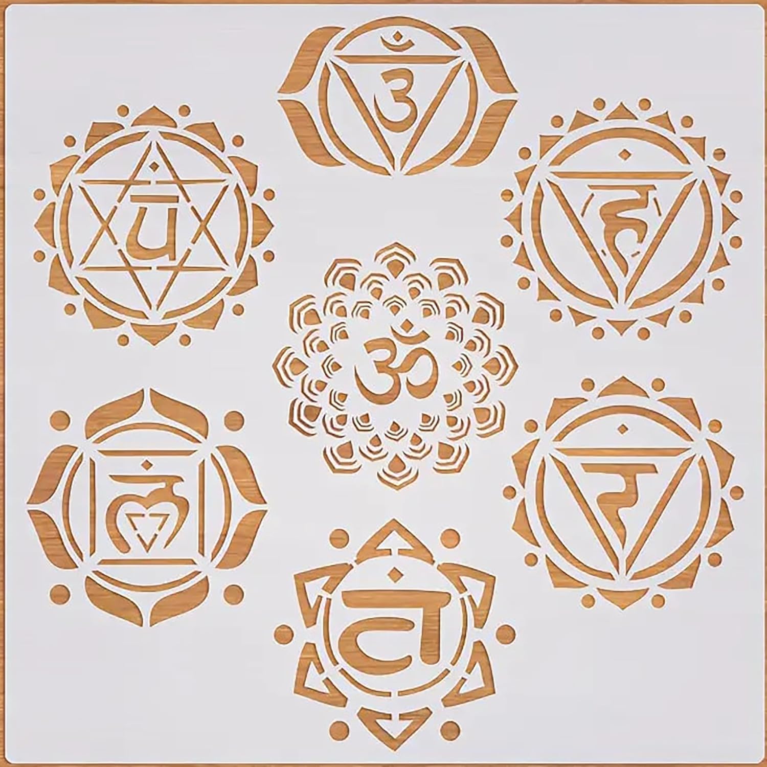 Set of gold chakra symbols on a white background