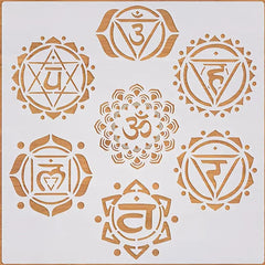Set of gold chakra symbols on a white background