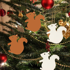 Decorative Christmas ornaments shaped like squirrels hanging on a tree.