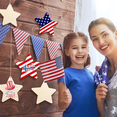 Woman and child holding American flags with decorative stars and bunting on a wooden background