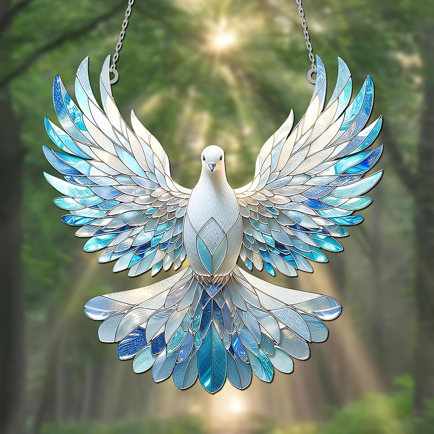Decorative glass dove with blue and white feathers against a blurred green background