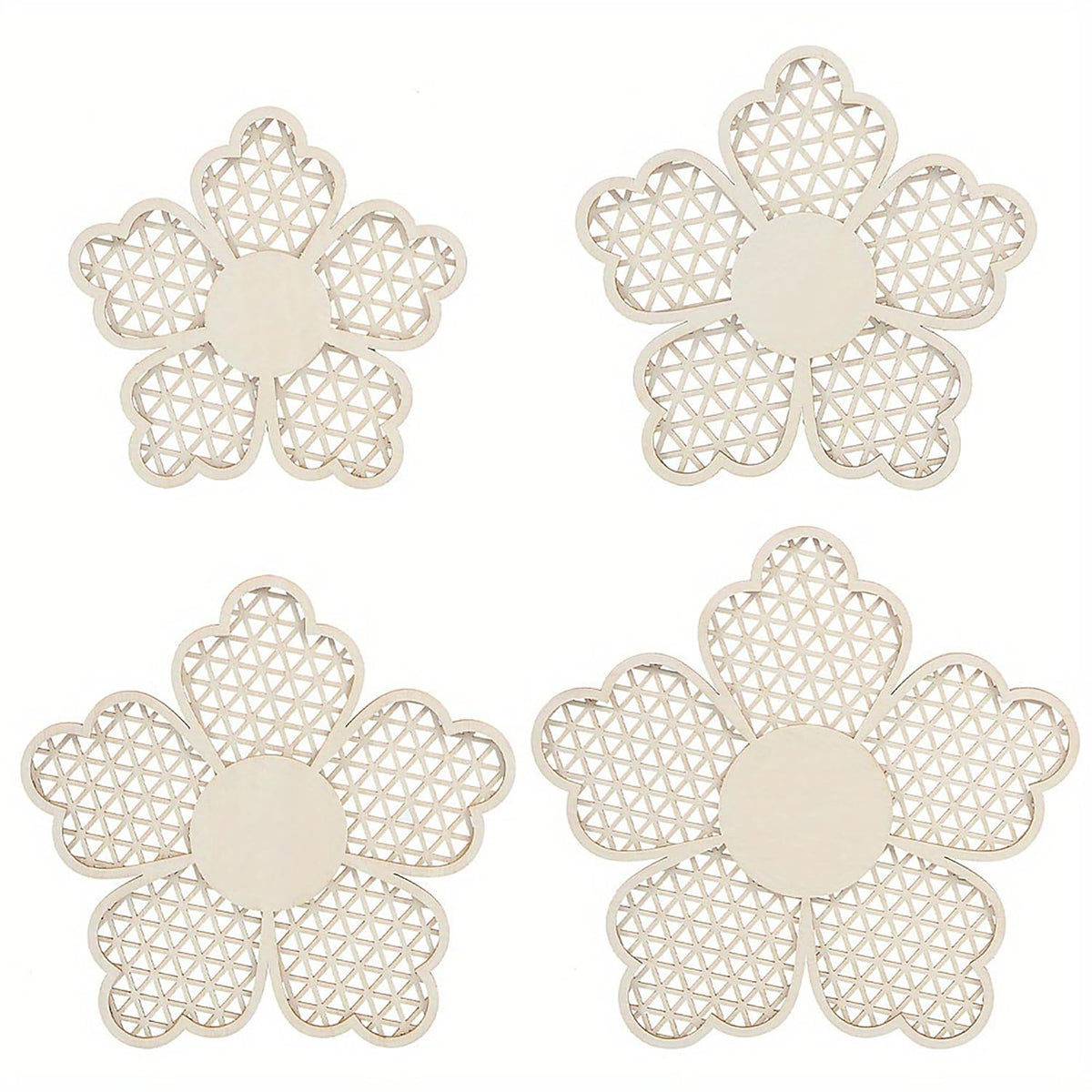 Four white flower-shaped coasters with intricate patterns on a white background