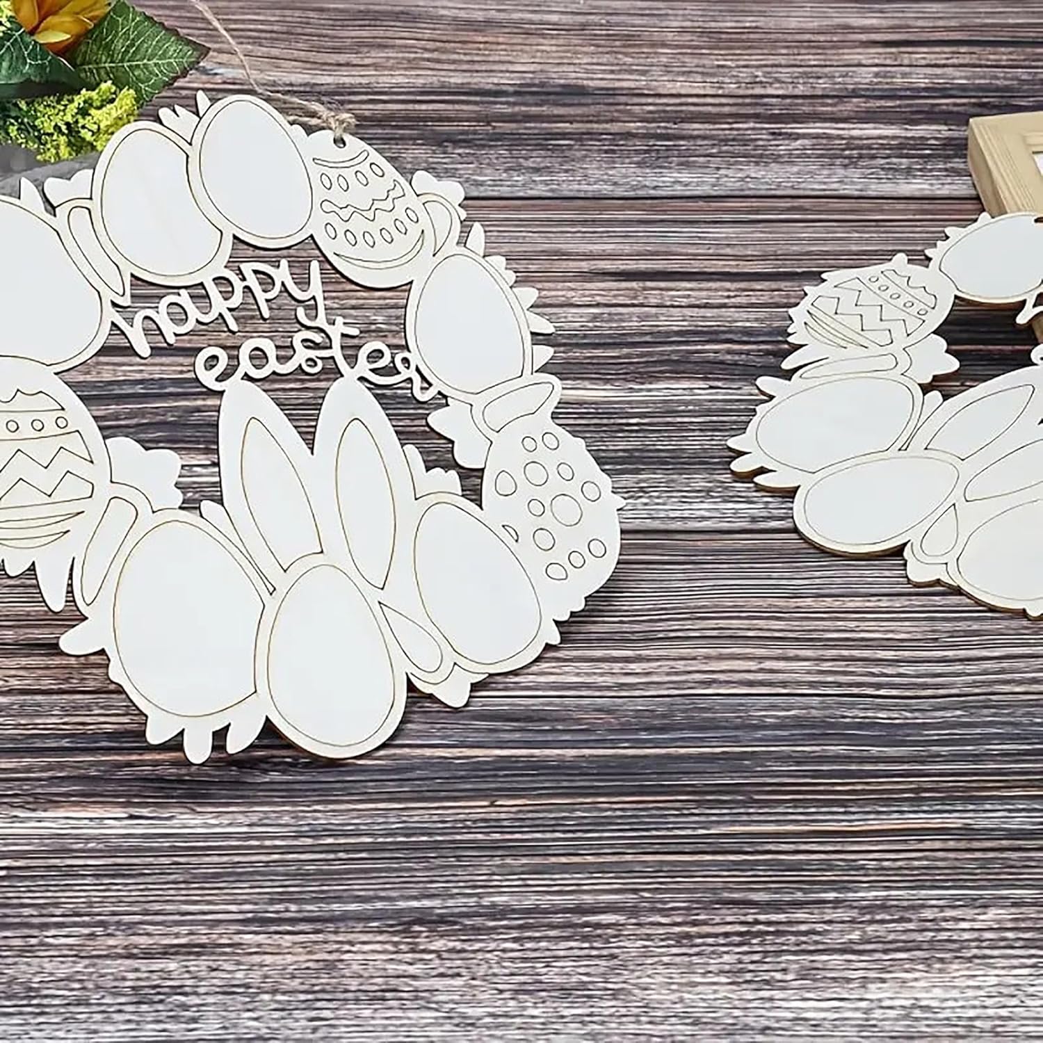 Decorative Easter cutouts on a wooden surface