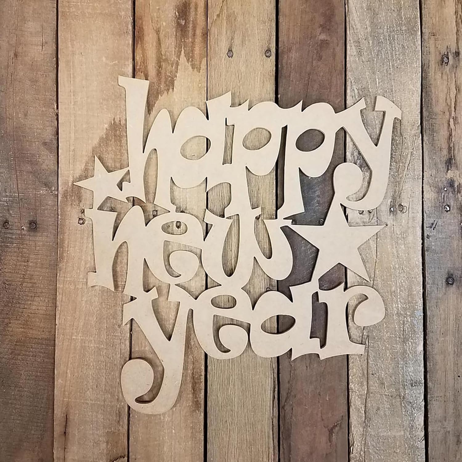 Wooden 'Happy New Year' decoration on a rustic wooden background