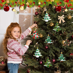 Child decorating a Christmas tree with ornaments in a festive setting.