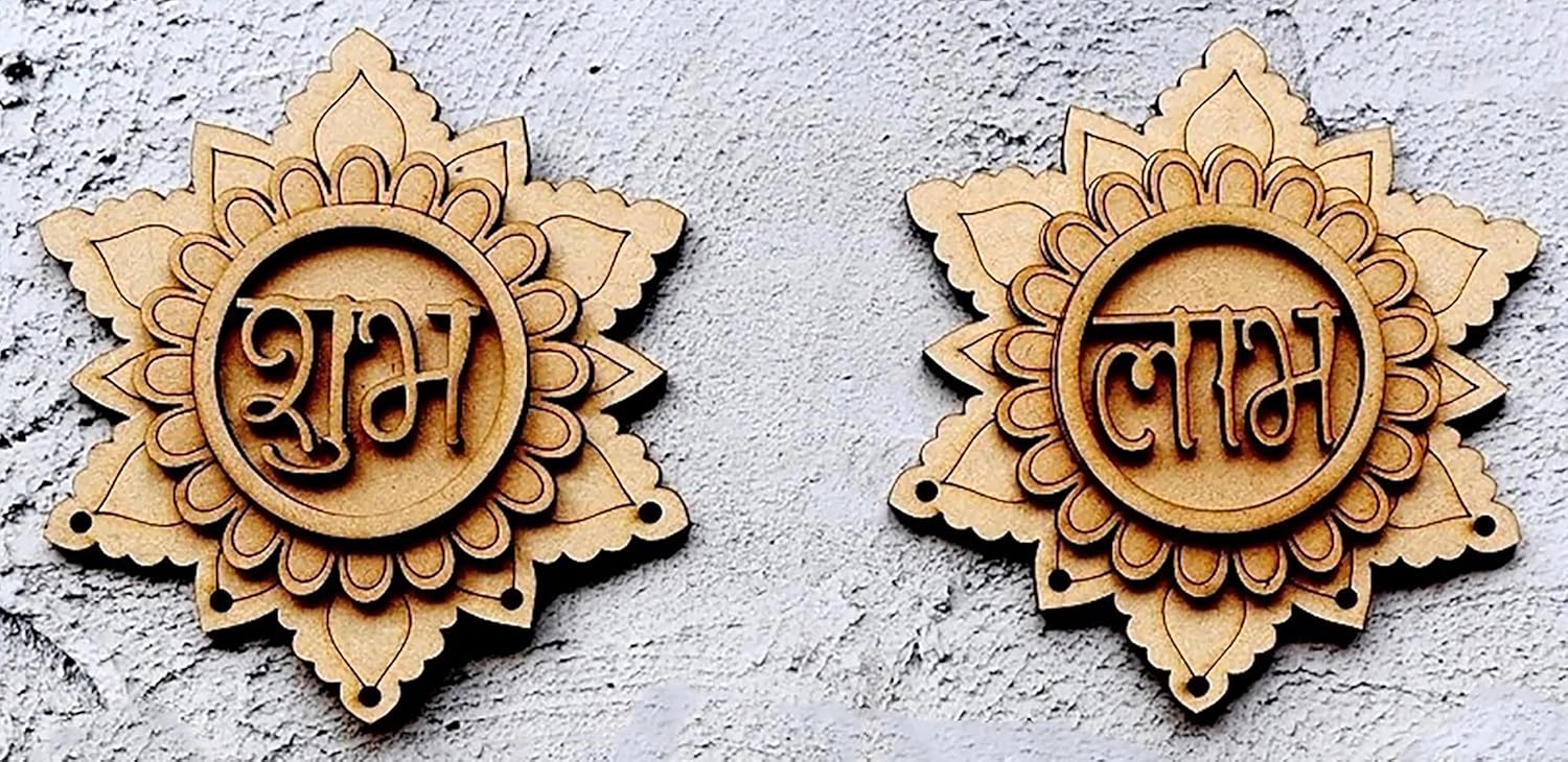 Two wooden decorative items with engraved text on a textured surface