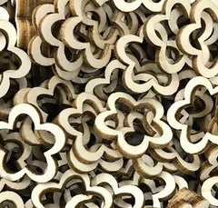 Close-up of wooden interlocking puzzle pieces.