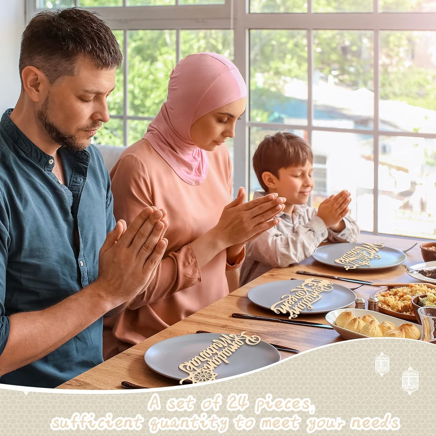 Family of three praying together at a dining table with plates and food.