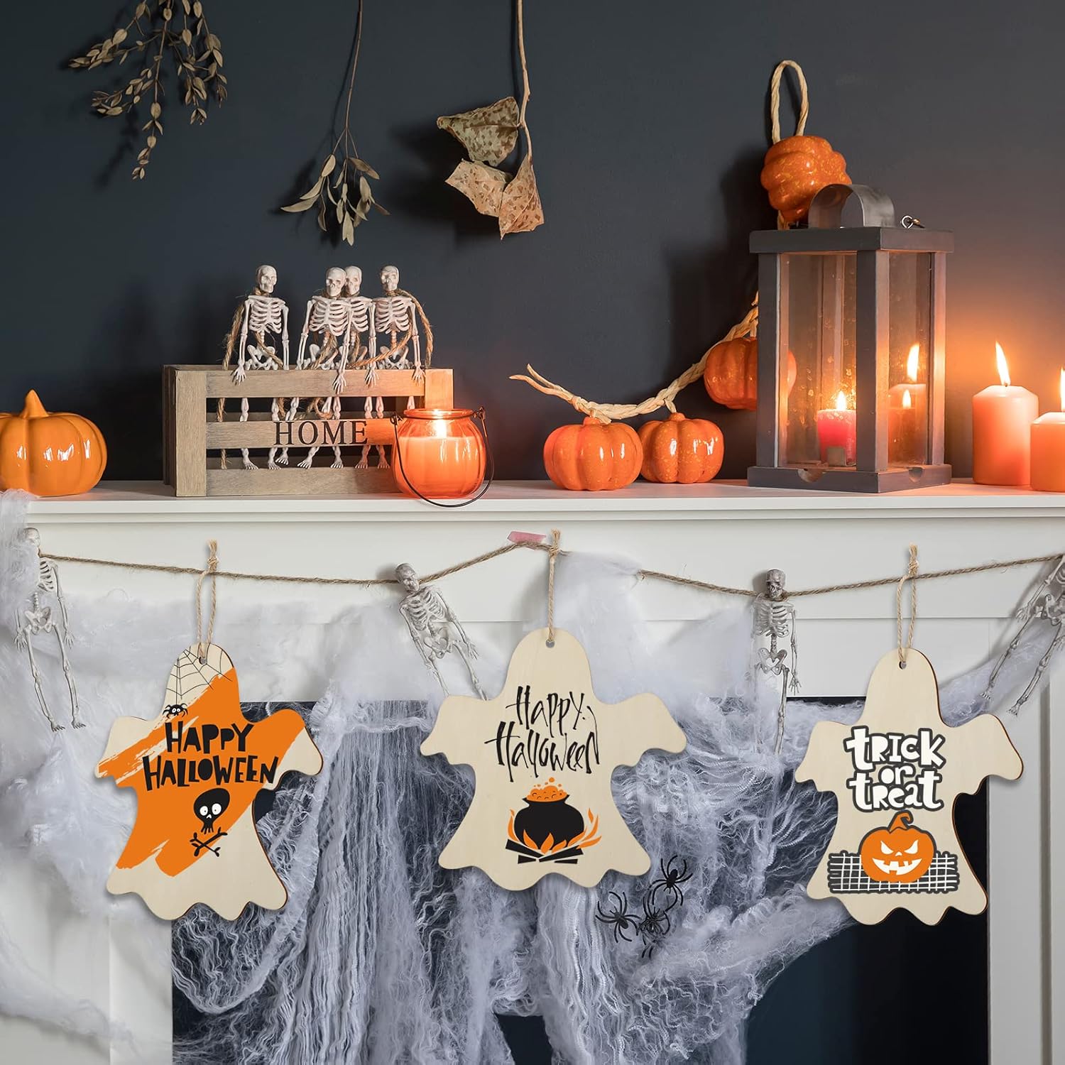 Halloween decorations including pumpkins, candles, and a 'Happy Halloween' banner on a dark background.
