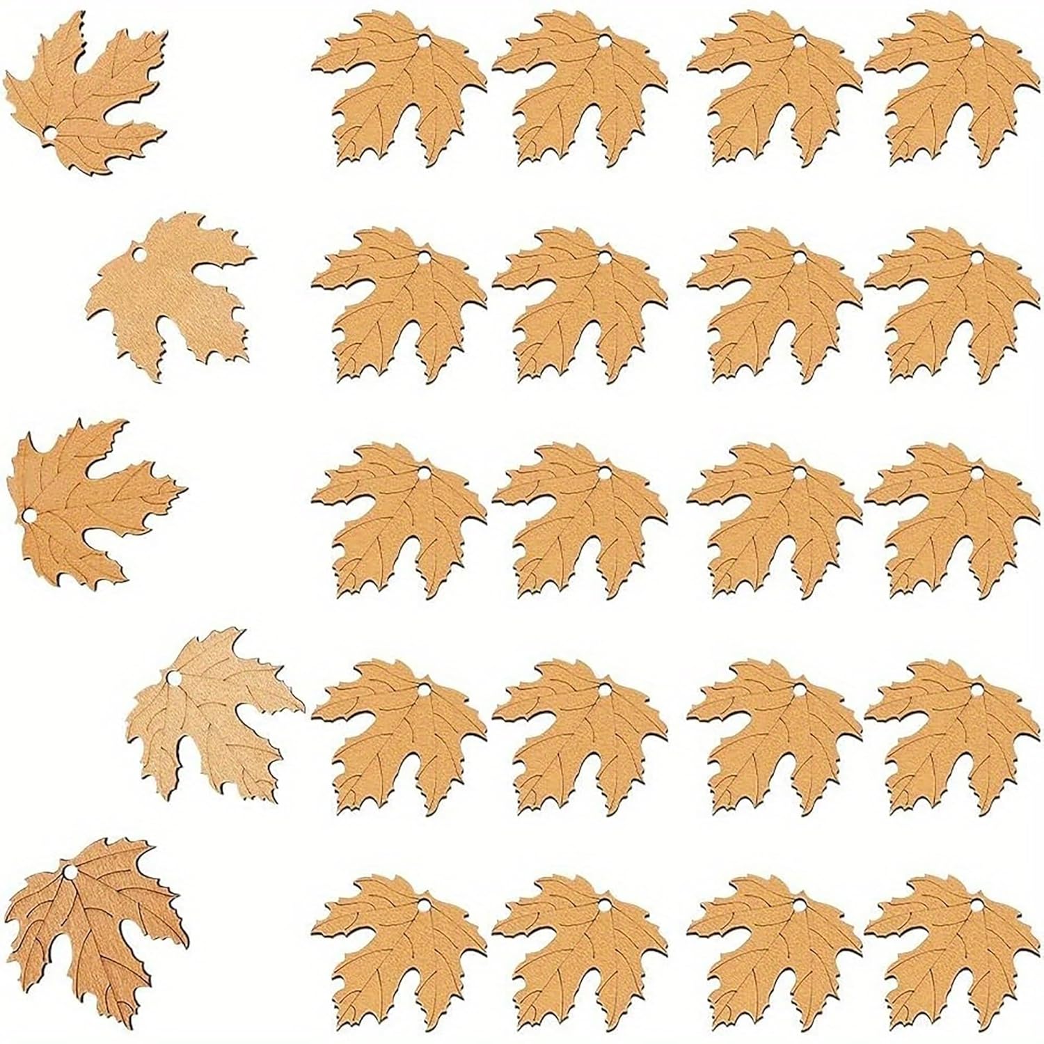 Set of leaf-shaped wooden pendants on a white background