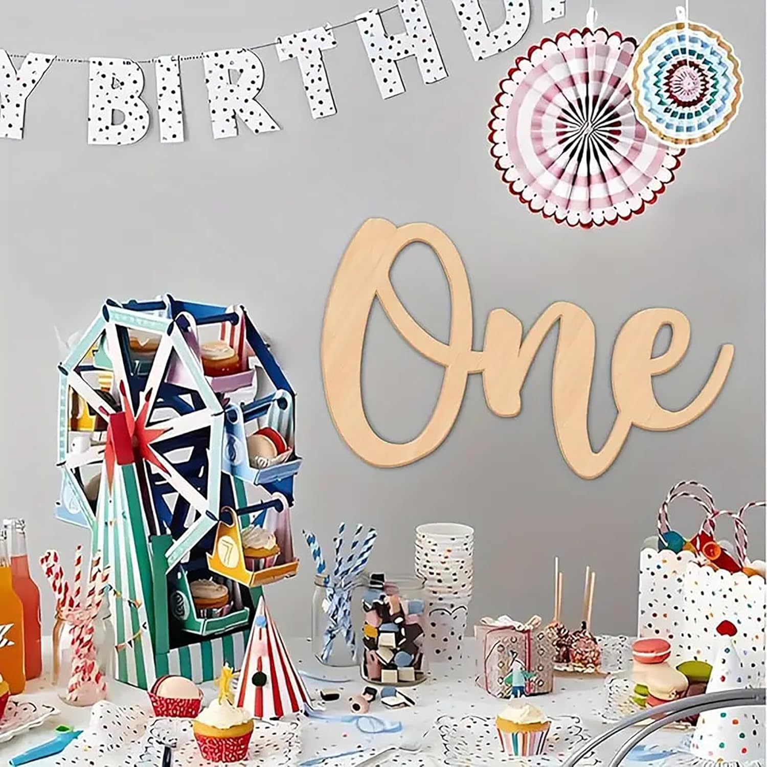 Children's birthday party setup with decorations, cake, and balloons.