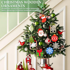 Decorative Christmas wreath with ornaments hanging on a door