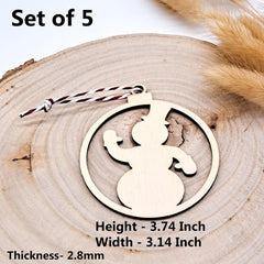 Wooden snowman ornament on a wooden surface with measurements displayed.