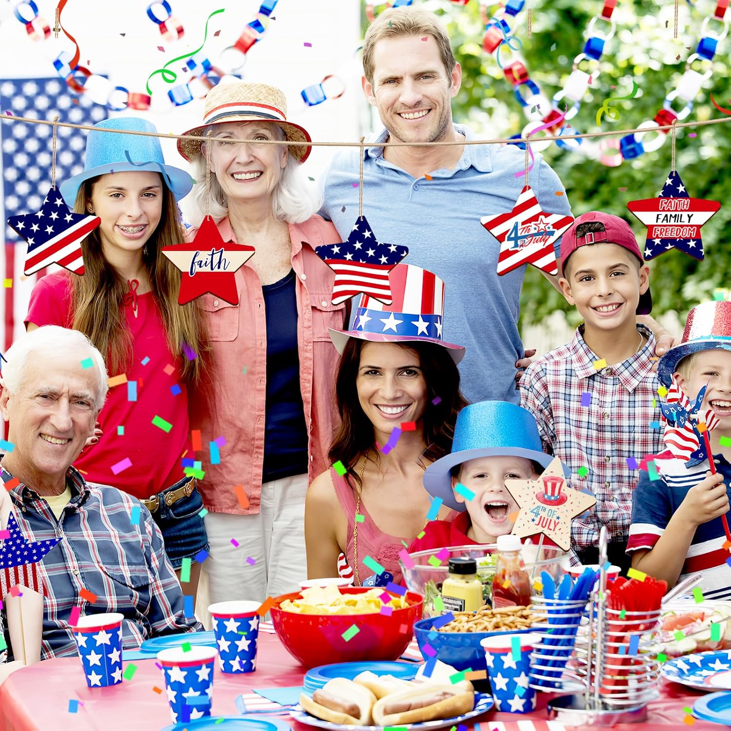 Family celebration with American flags and confetti, outdoor setting