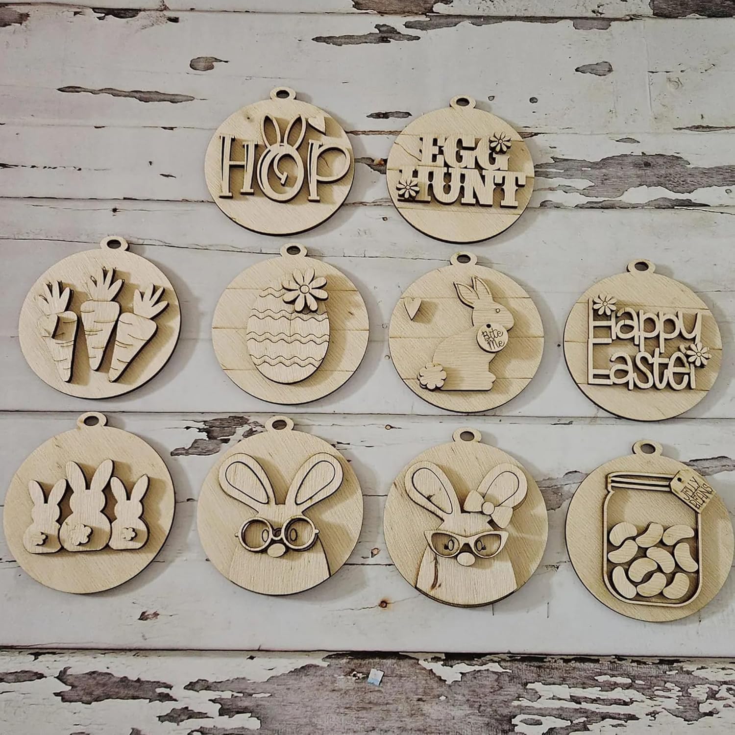 Set of wooden Easter-themed ornaments on a rustic wooden background