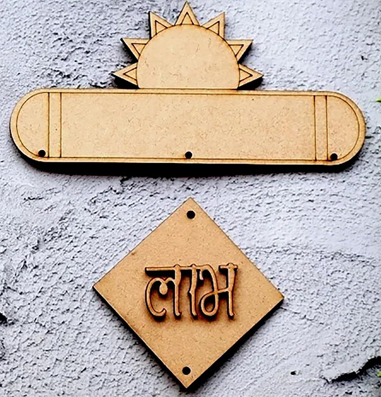 Three wooden nameplates with different shapes and text on a textured gray background