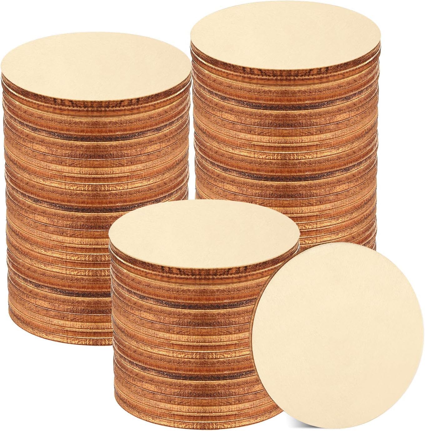 Stacks of round wooden coasters on a white background