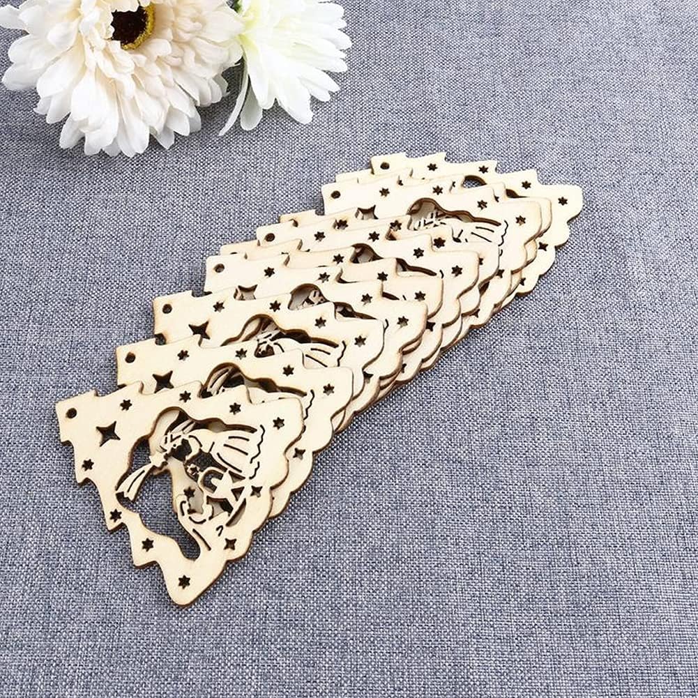 Decorative wooden cutouts with intricate designs on a gray fabric background.