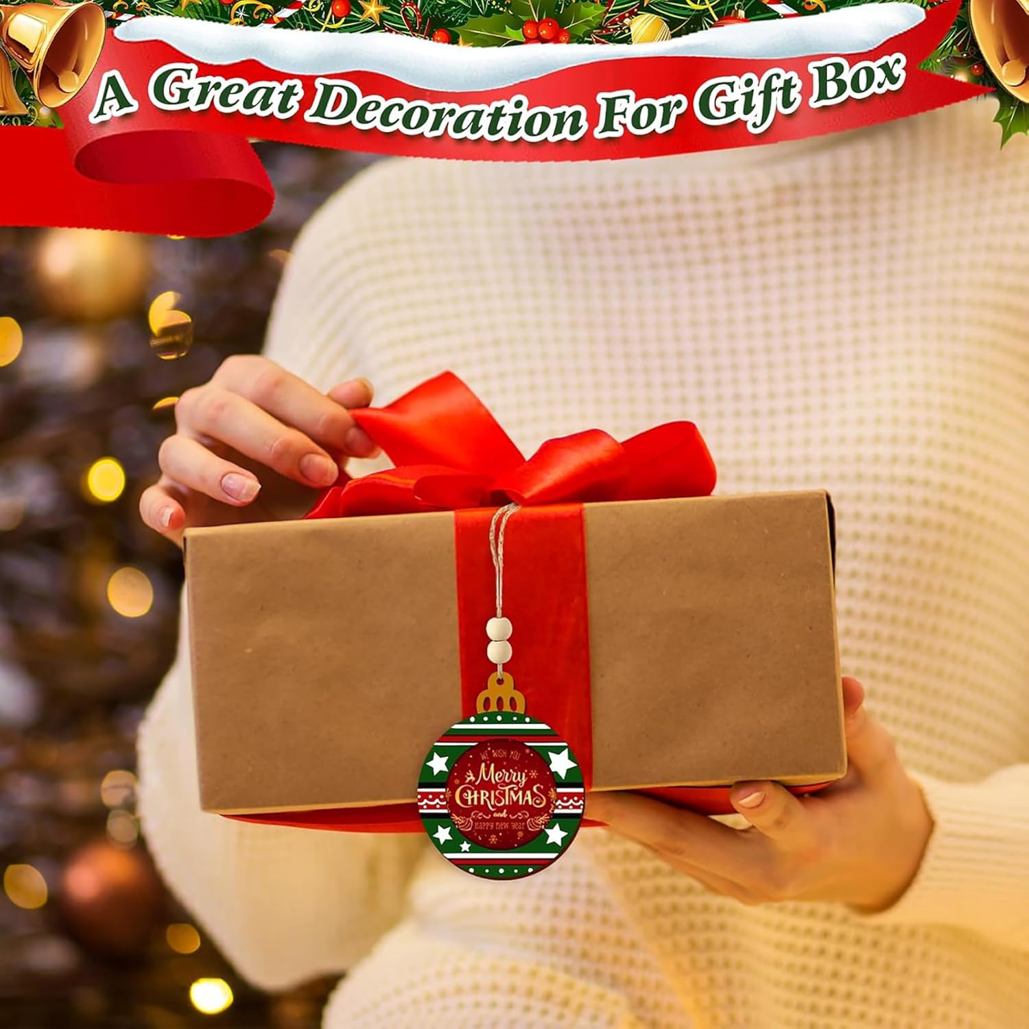 Person holding a gift box with a red ribbon and a Christmas ornament, with a festive background.