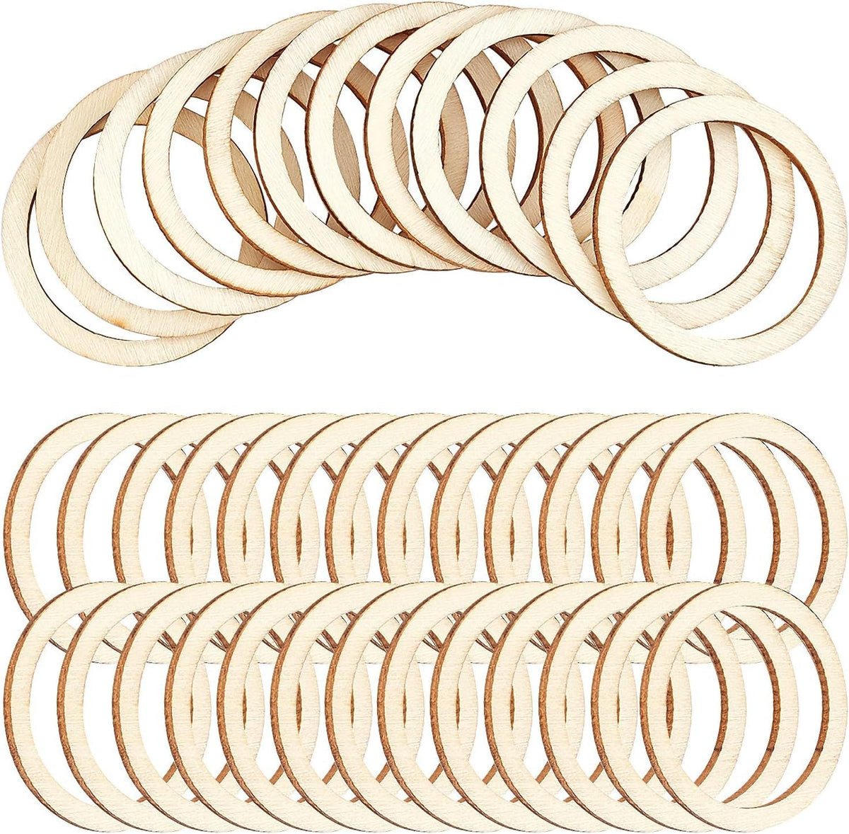 Multiple wooden rings stacked on a white background