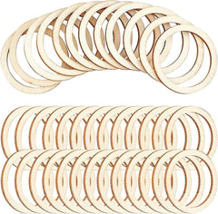 Multiple wooden rings stacked on a white background