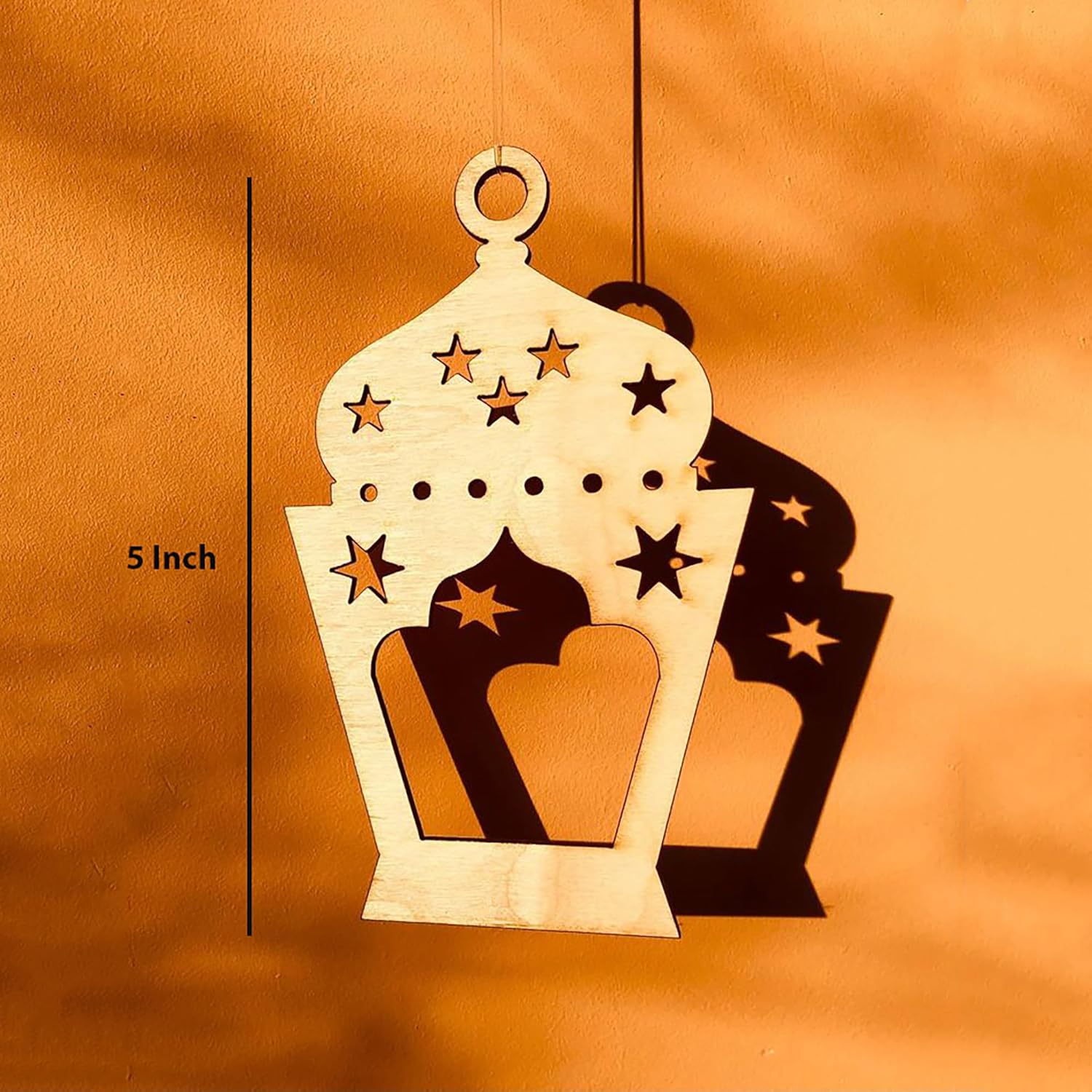 Decorative lantern with star patterns on an orange background, showing measurement of 5 inches.