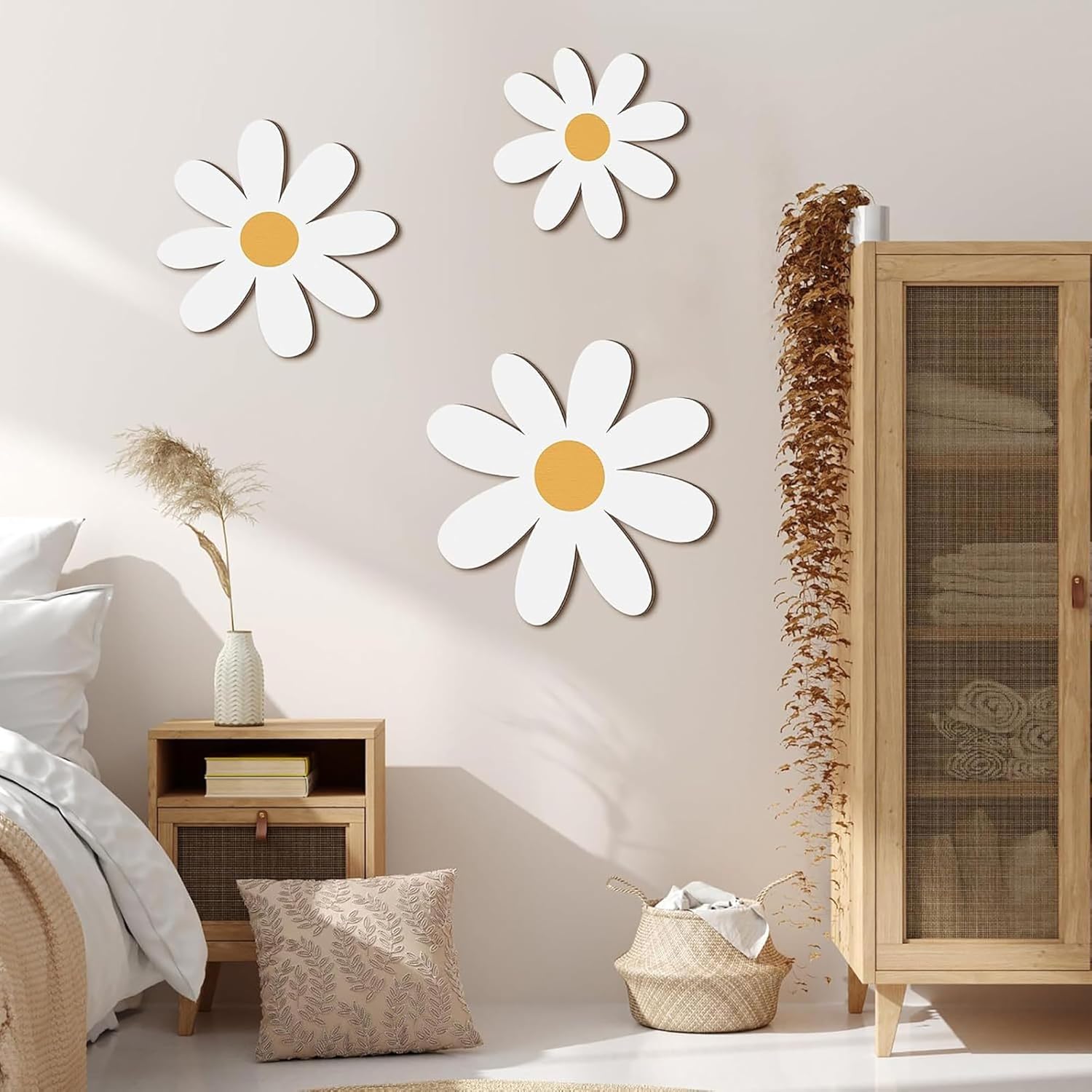 Decorative daisy flowers on a wall in a bedroom setting with furniture and decor.