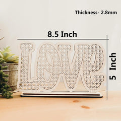 Decorative sign with 'LOVE' text and measurements on a light background