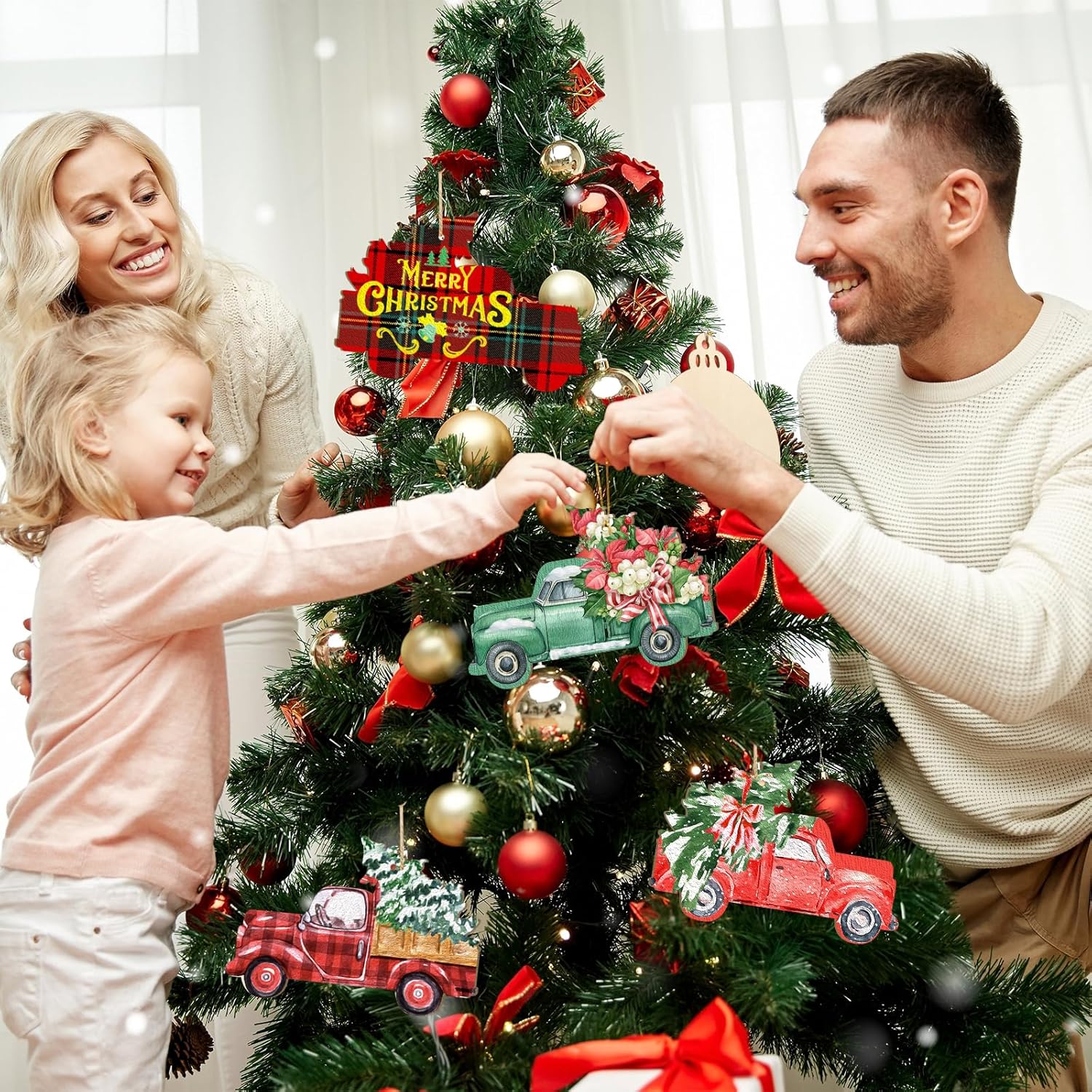 Family decorating a Christmas tree with ornaments