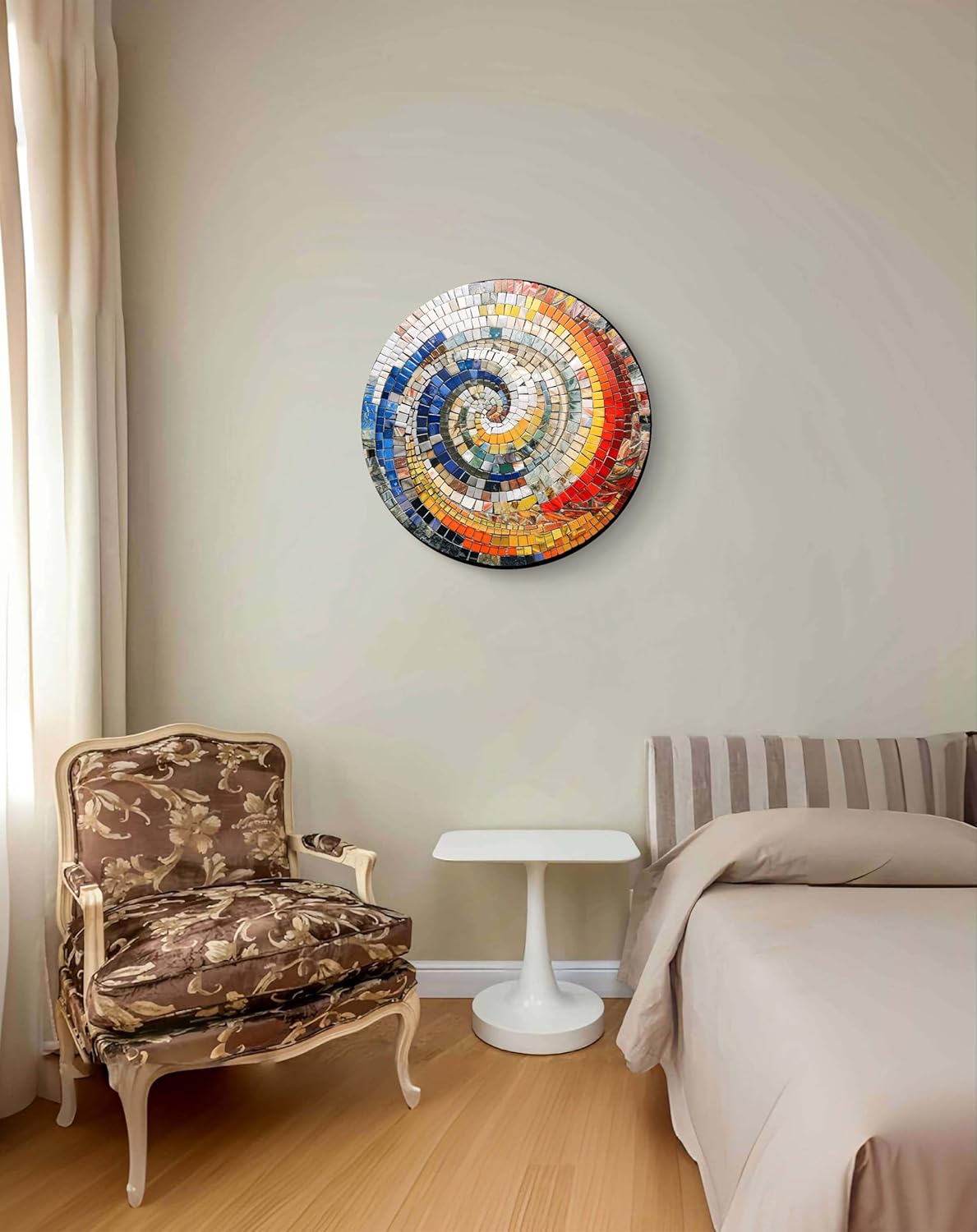 Colorful spiral wall art above a chair and bed in a room.