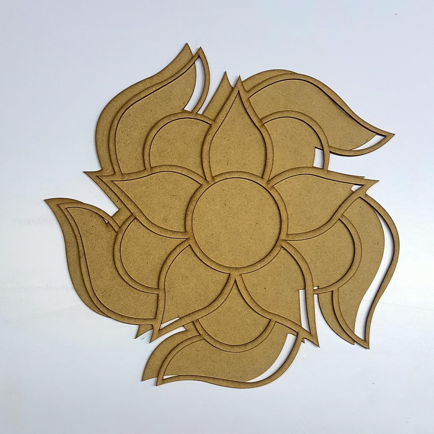 Decorative brown flower-shaped cutout on a white background