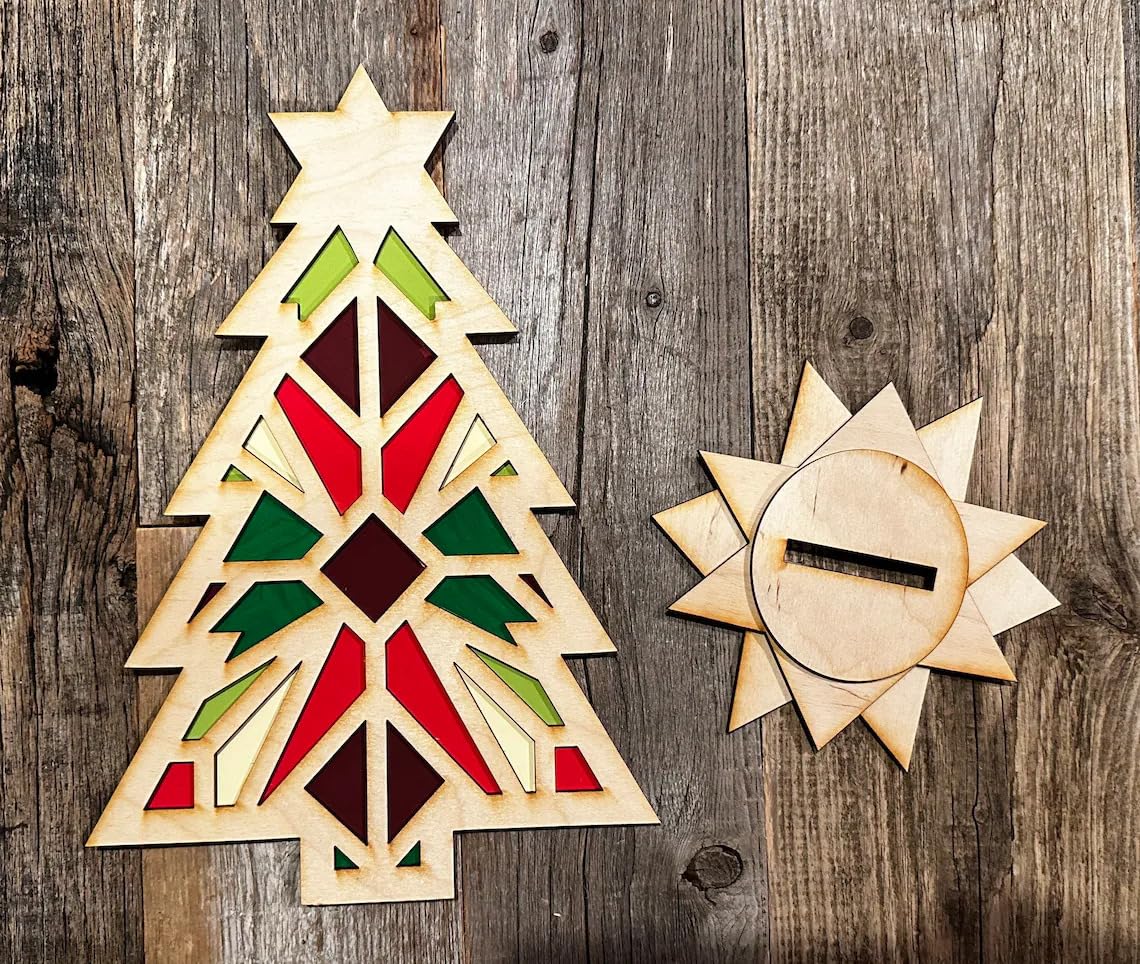 Wooden Christmas tree and star ornament on a wooden surface