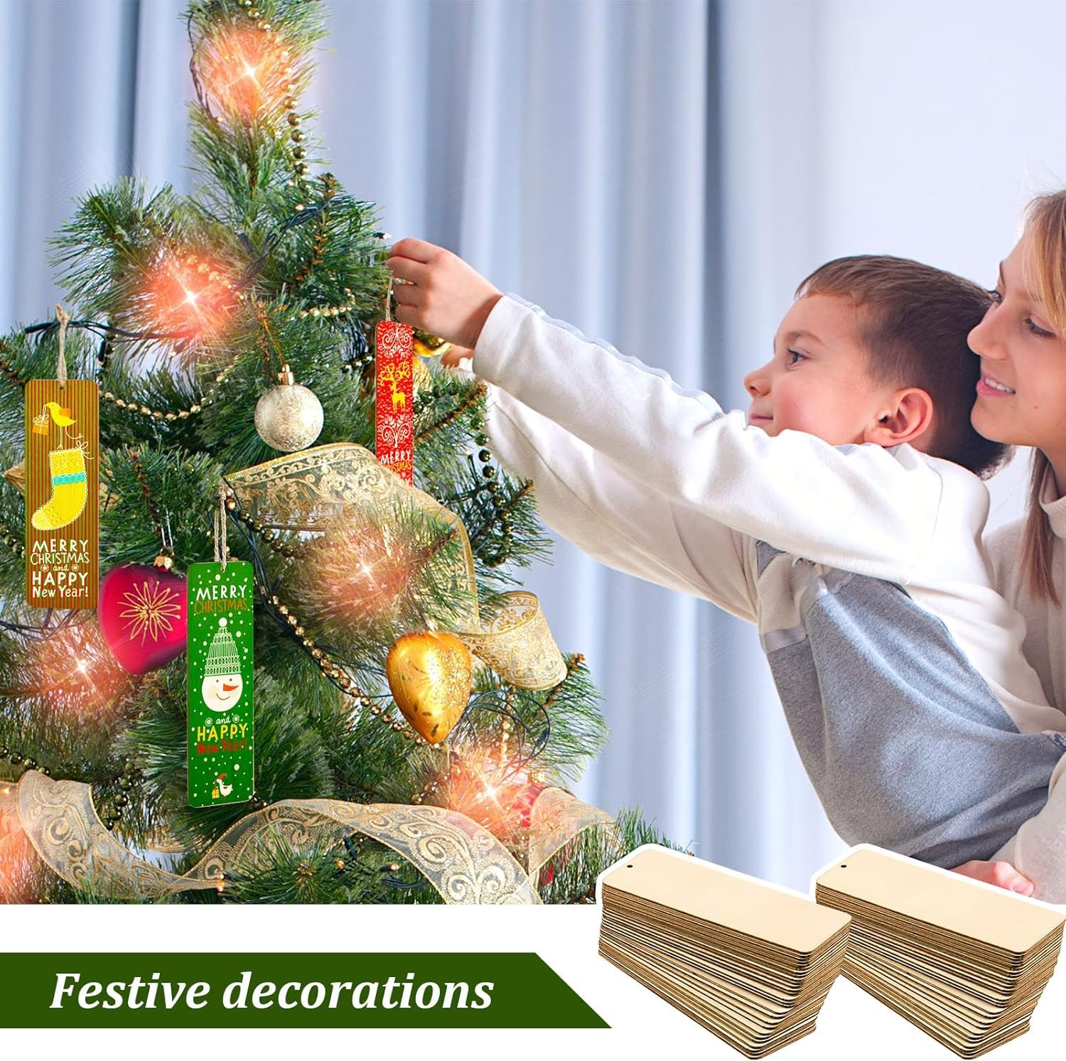 Woman and child decorating a Christmas tree with festive decorations.