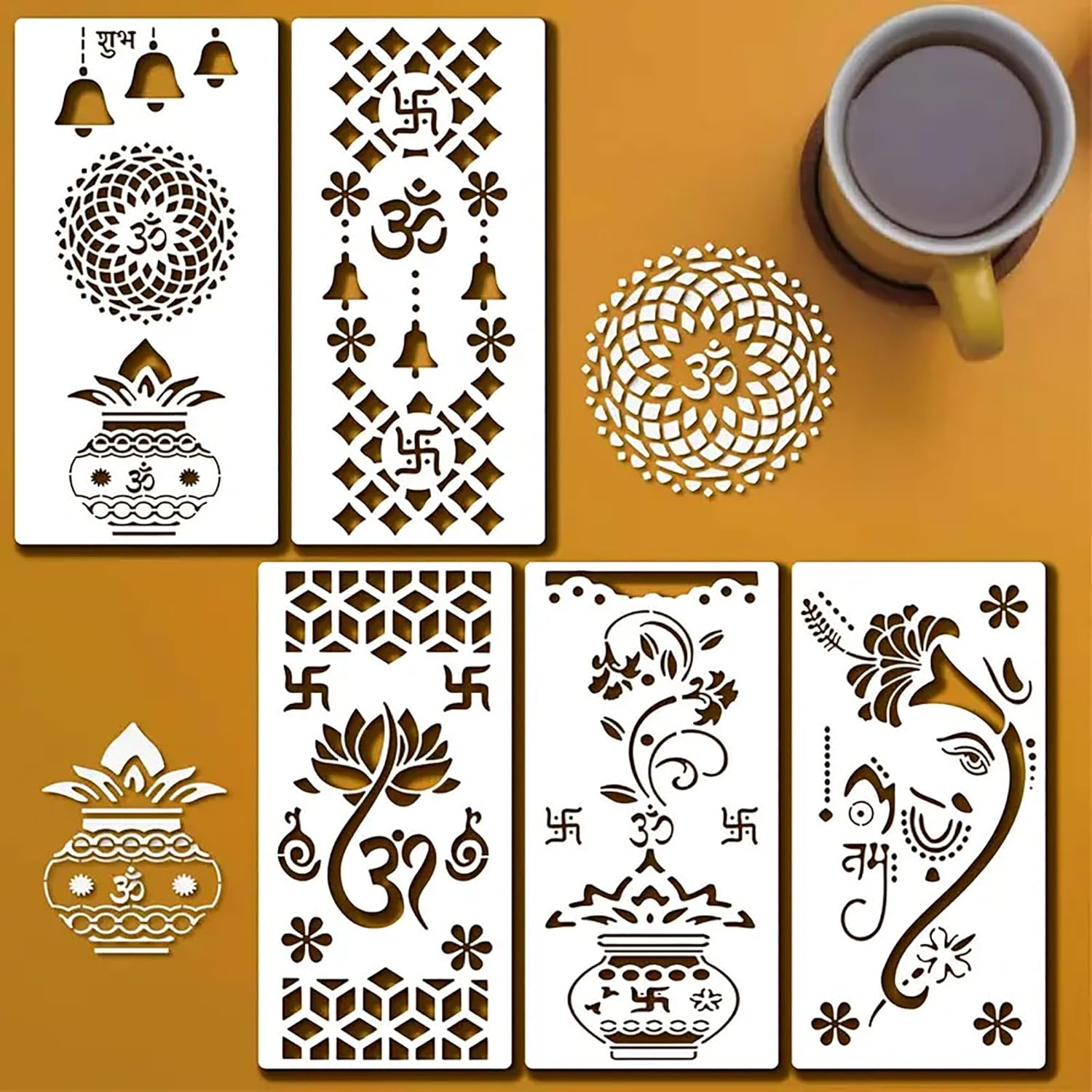 Set of decorative stencils with intricate designs on a yellow background, accompanied by a cup of coffee.