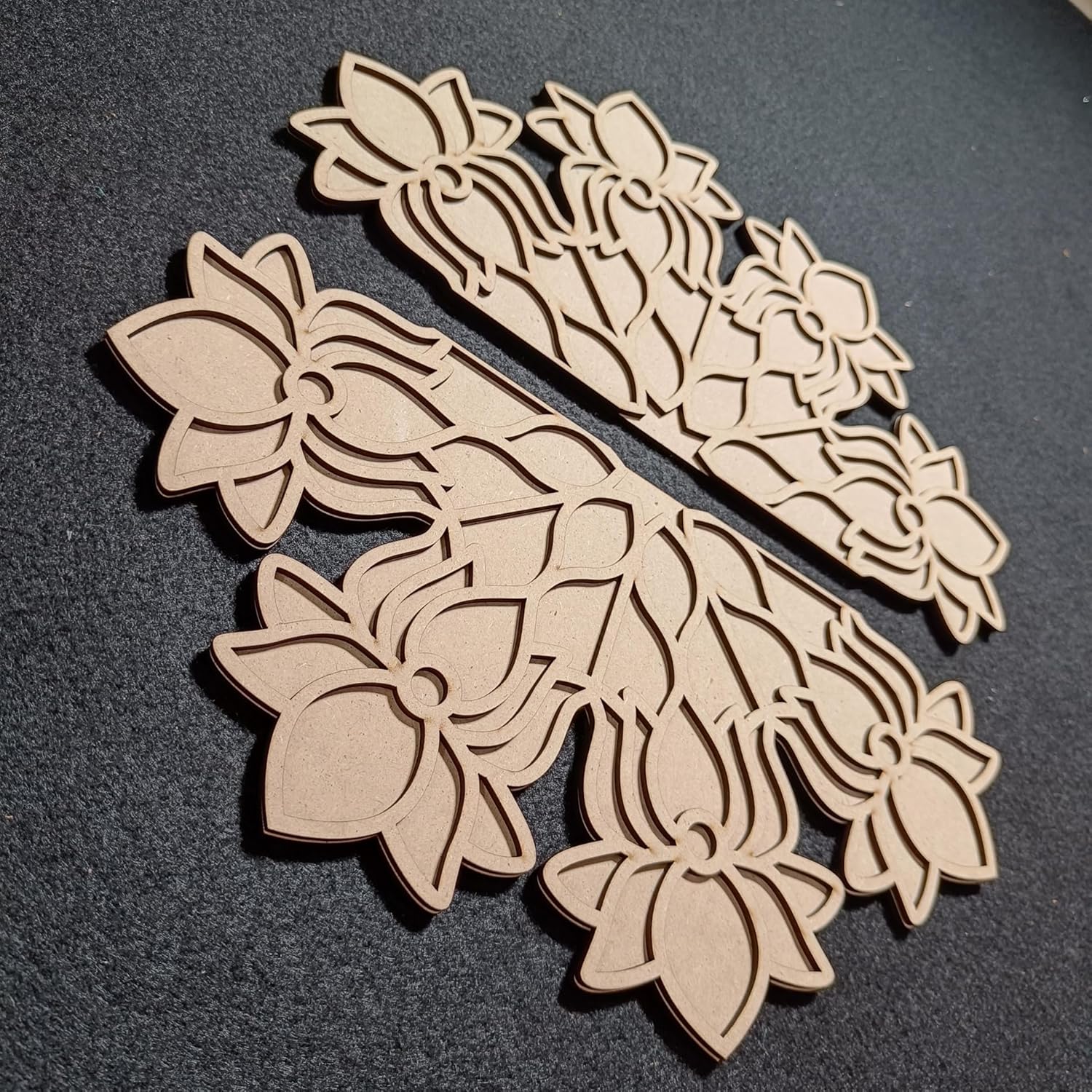 Wooden floral cutouts on a black background