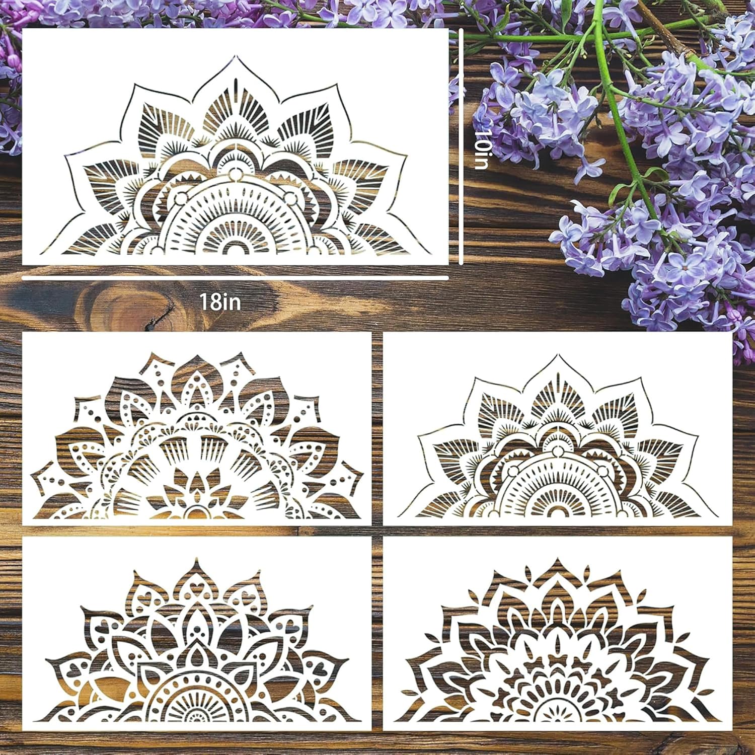 Set of decorative stencils with floral patterns on a wooden surface with purple flowers.
