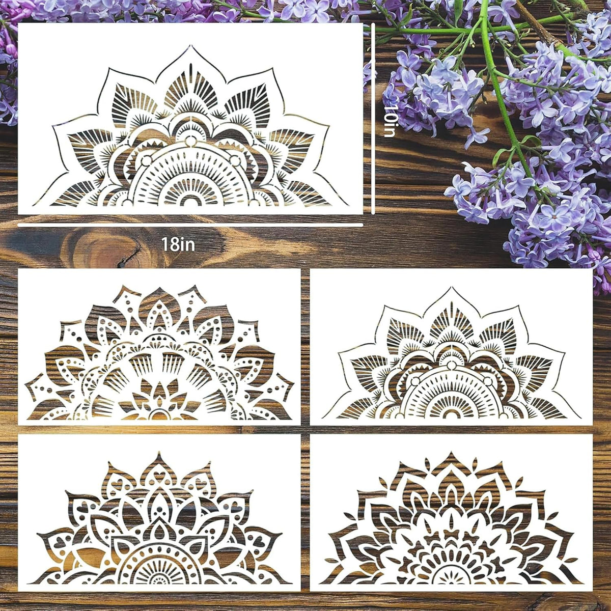 Set of decorative stencils with floral patterns on a wooden surface with purple flowers.
