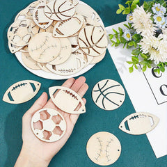Wooden sports-themed coasters on a teal surface with a hand holding one coaster.