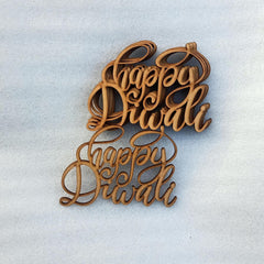 Wooden 'Happy Diwali' decorations on a light blue background